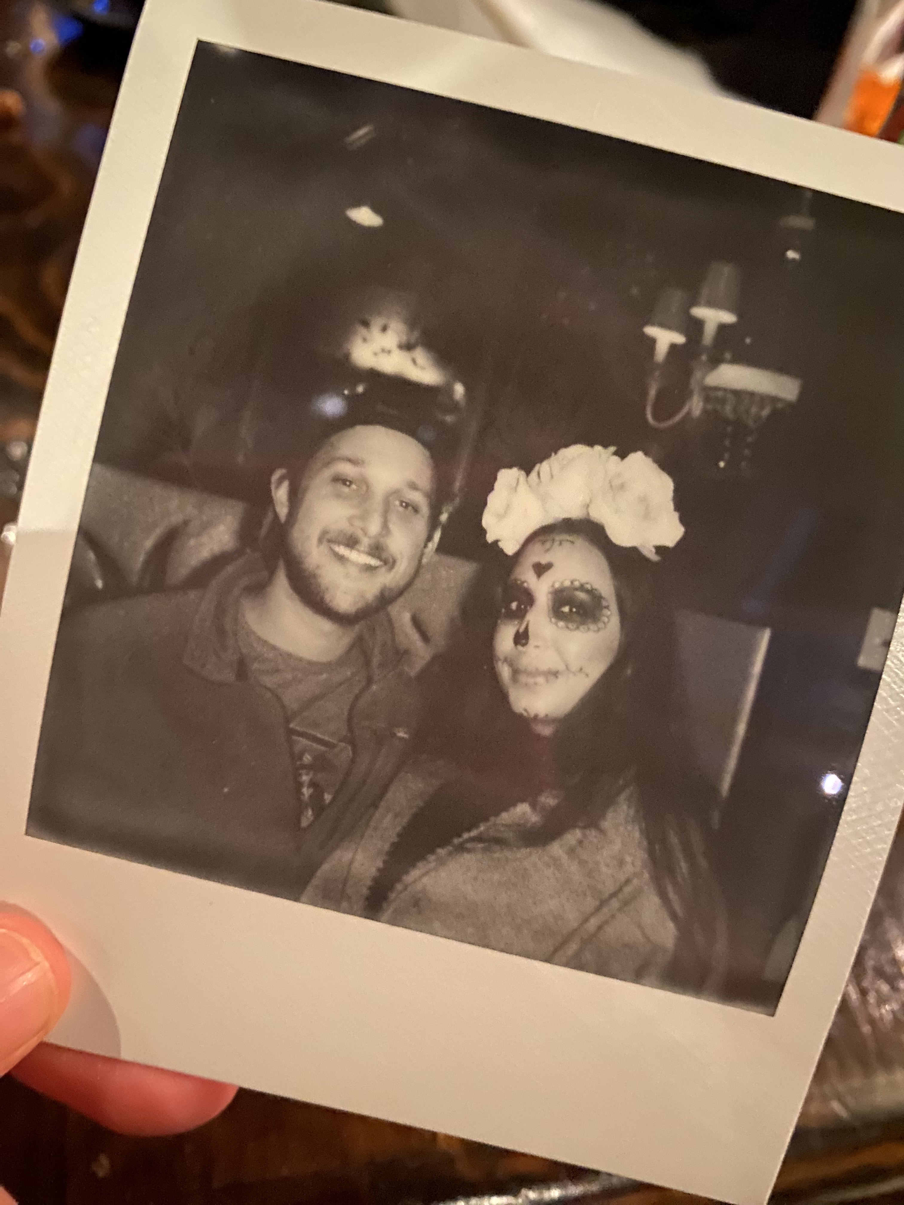 Polaroid of Peter and Cristina with face paint