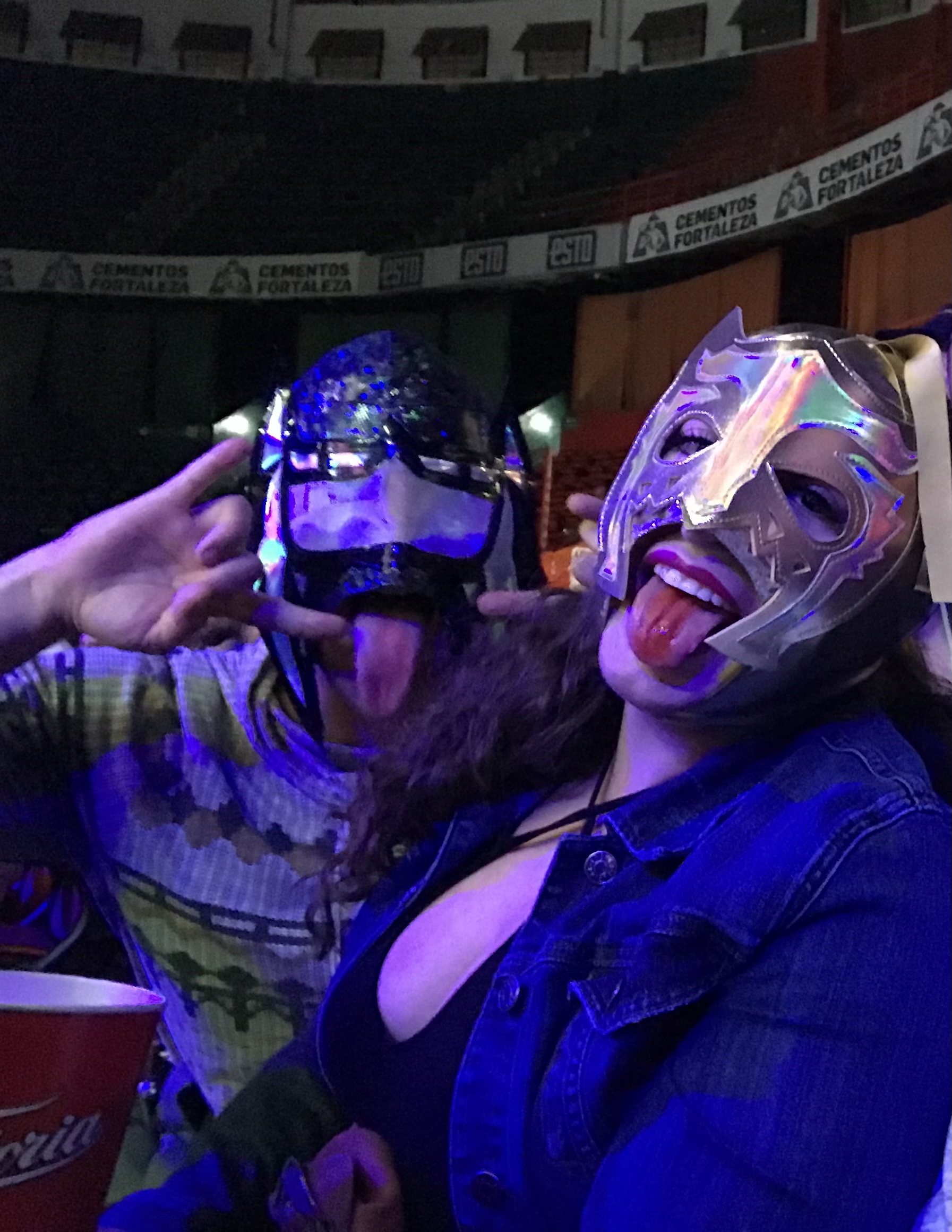 Peter and Cristina in lucha libre masks